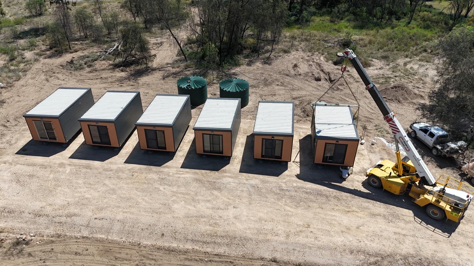 Aerial installation of six portable accommodation units
